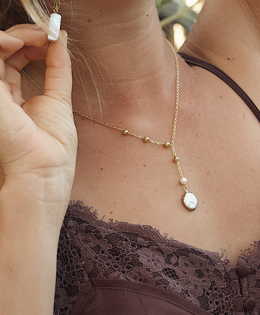 The Gold Pearl Necklace
