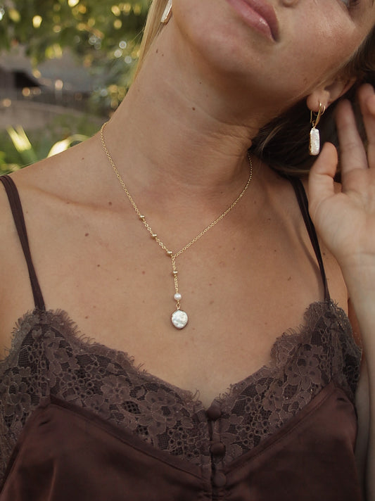 The Gold Pearl Necklace